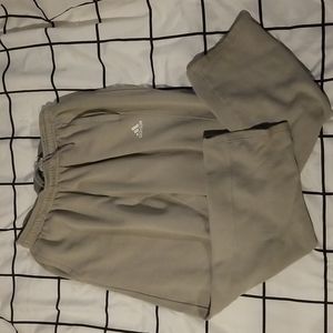 Adidas sweatpants.